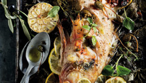 Whole baked fish with olives and capers