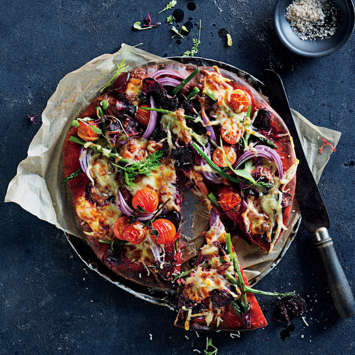 Beetroot pizza with asparagus and Emmental