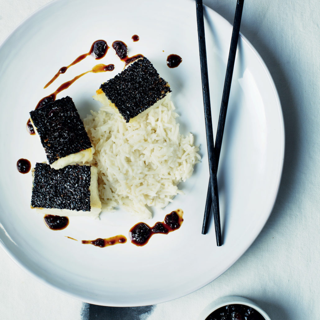 Black sesame crusted fish with coconut rice and crushed olive glaze