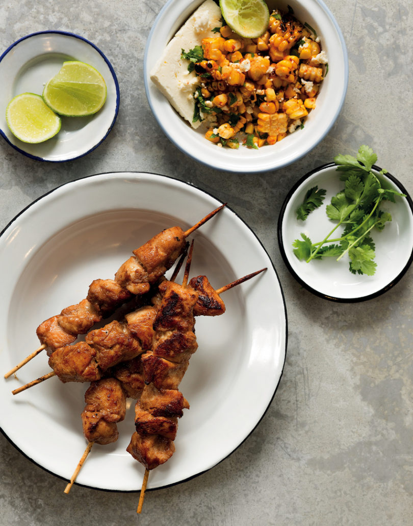 Spicy chicken skewers with charred corn salad