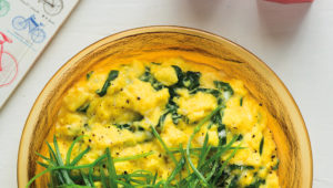 Scrambled eggs with mixed greens