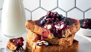 Mixed berry French toast with toasted almonds