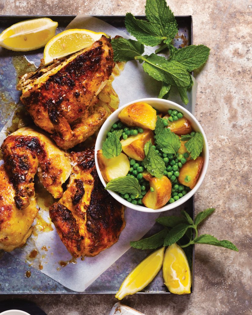 Roast chicken with pea and mint roast potatoes